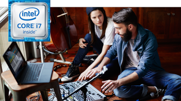  Intel Core i7 and man and woman playing piano on laptop